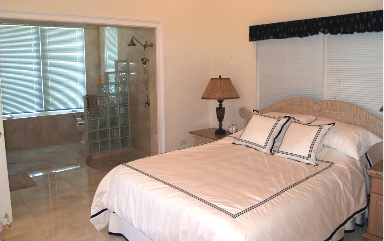 coral beach house master bed room